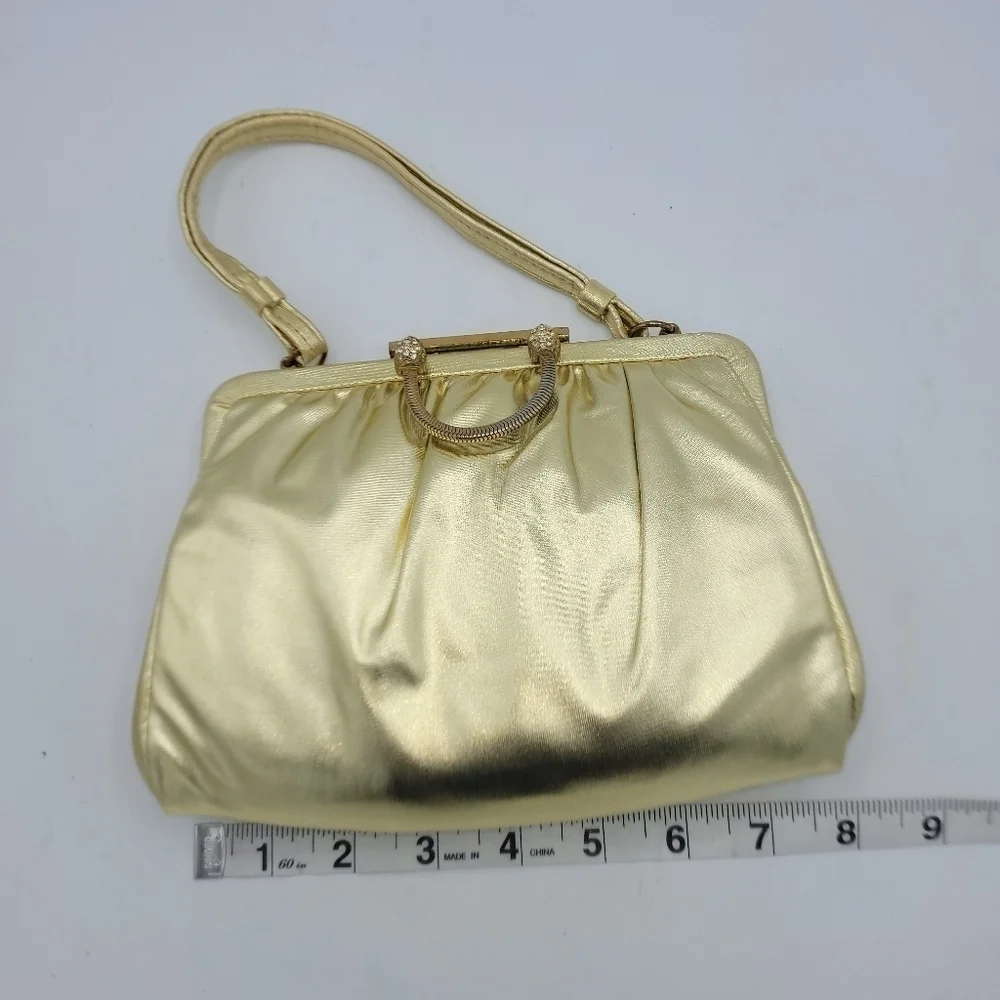 Vintage Andé Gold Clutch With Rhinestone Details Clasp.